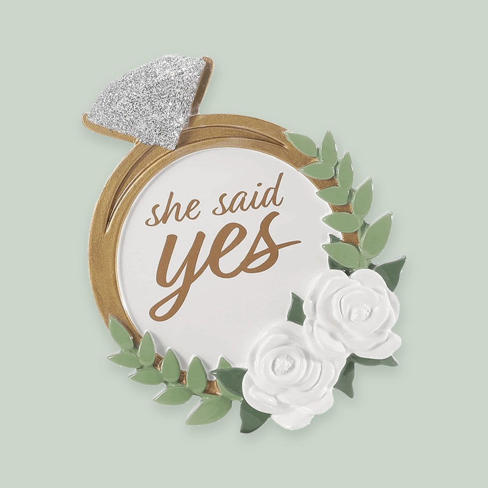 She Said Yes Engagement Ring ornament on a sage green background