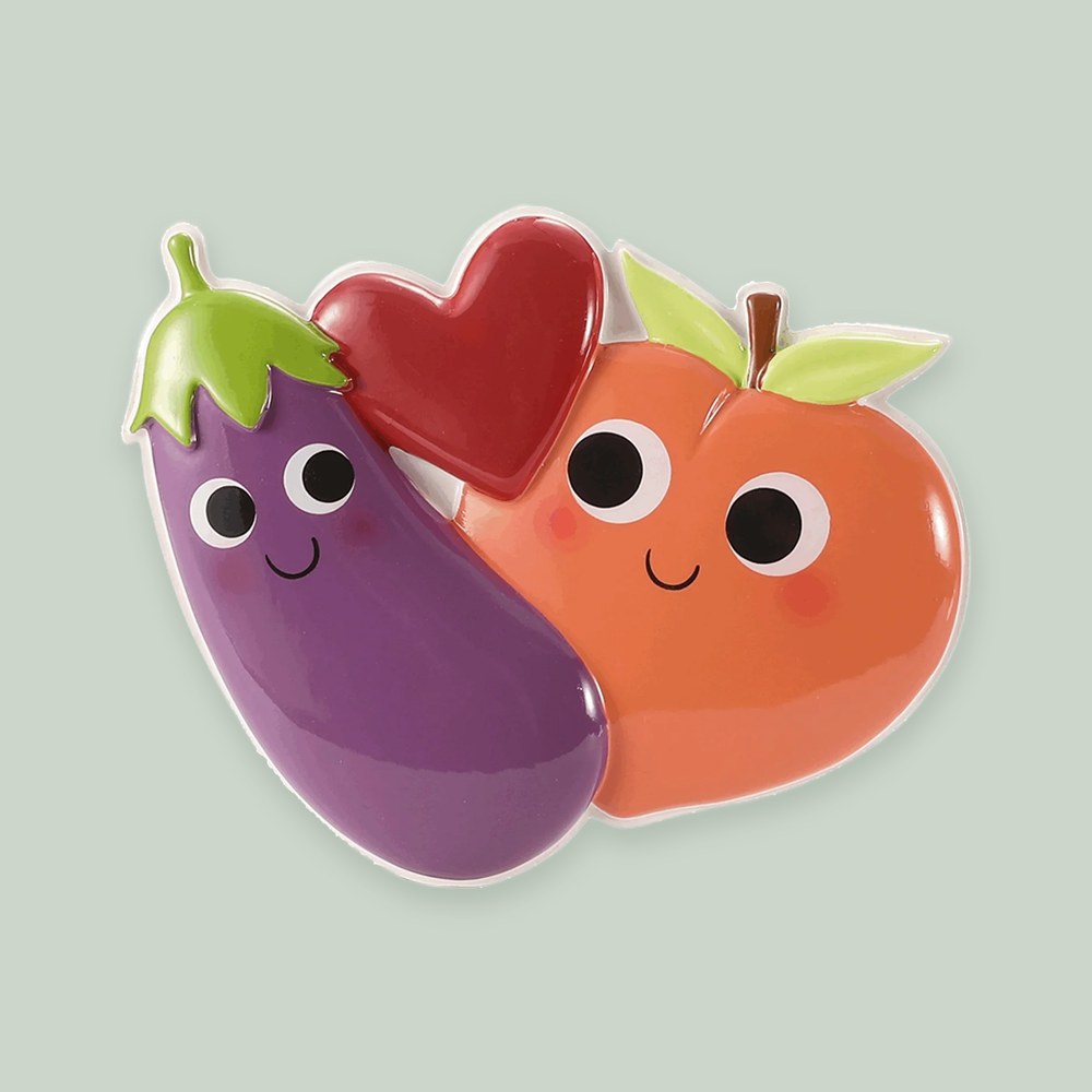 Eggplant and Peach Couple ornament on a sage green background