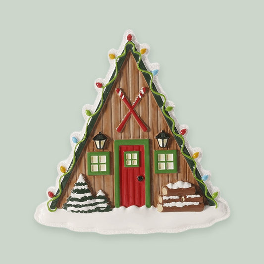 Ski Lodge with Hanging Skis ornament on a sage green background