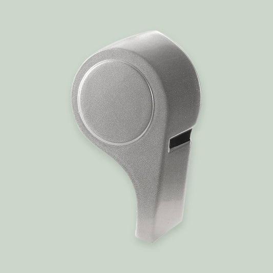 Coach Whistle ornament on a sage green background