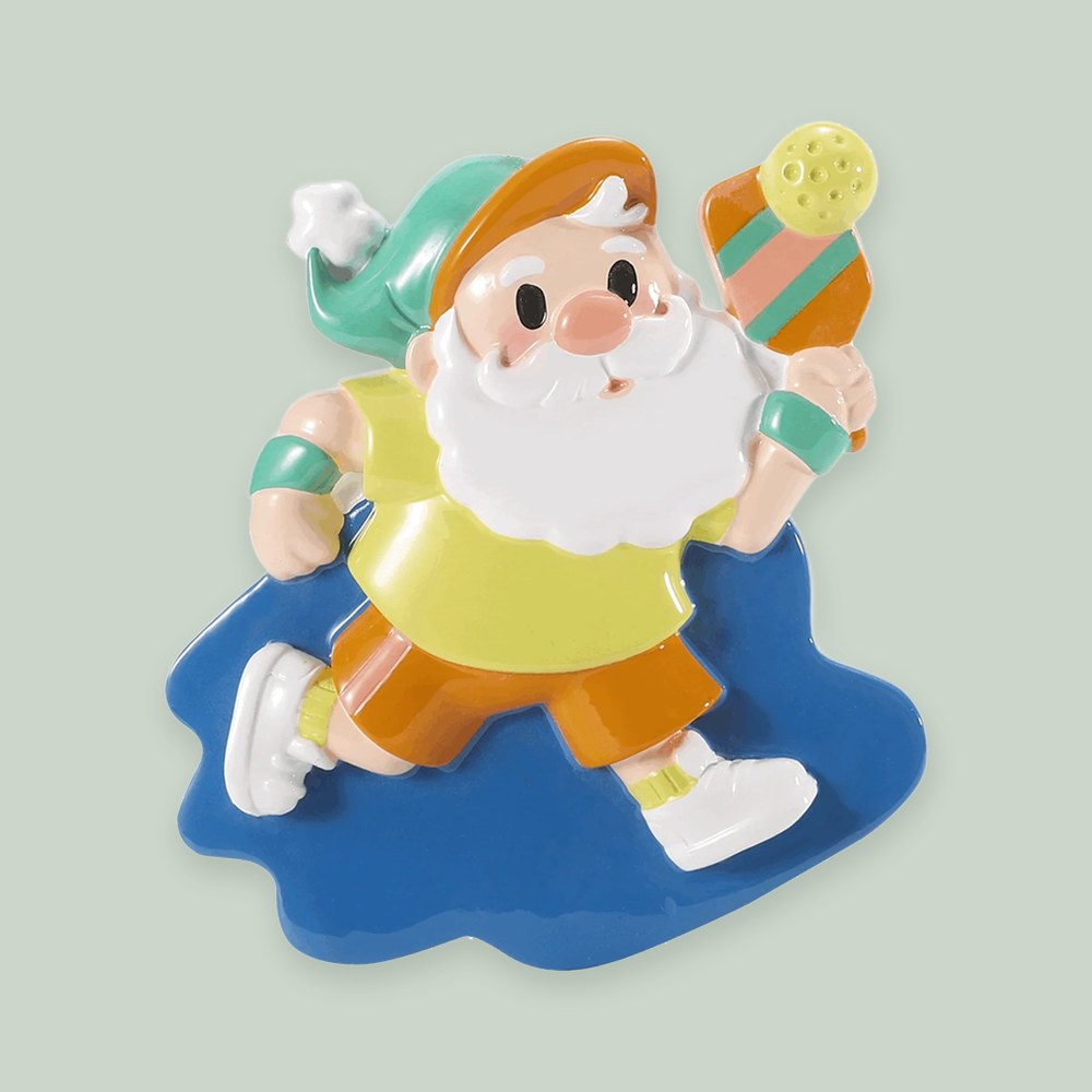 Pickleball Santa ornament on a sage green background