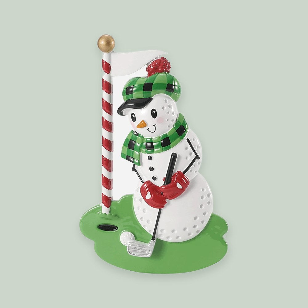 Golf Ball Snowman ornament on a sage green background