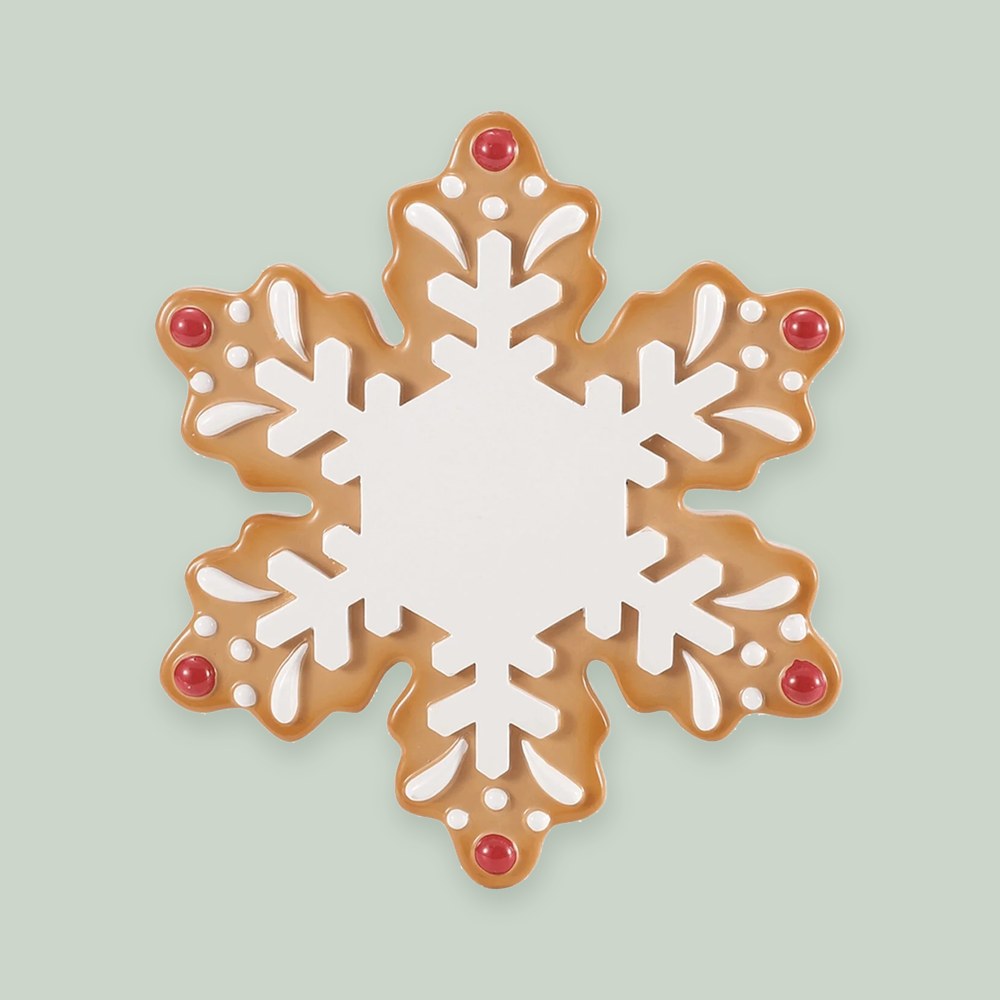 Gingerbread Snowflake ornament on a sage green background