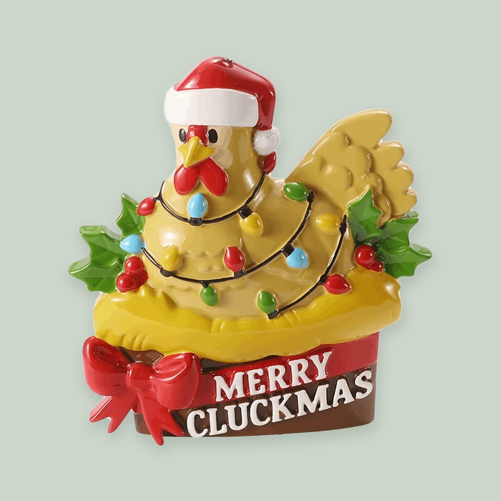 Merry Cluckmas ornament on a sage green background