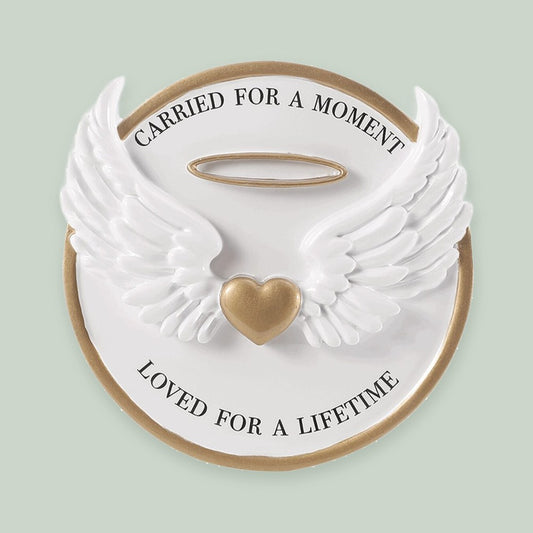 Carried for a Moment, Loved for a Lifetime ornament on a sage green background