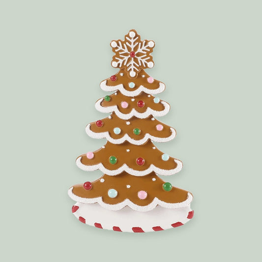 Gingerbread Tree ornament on a sage green background