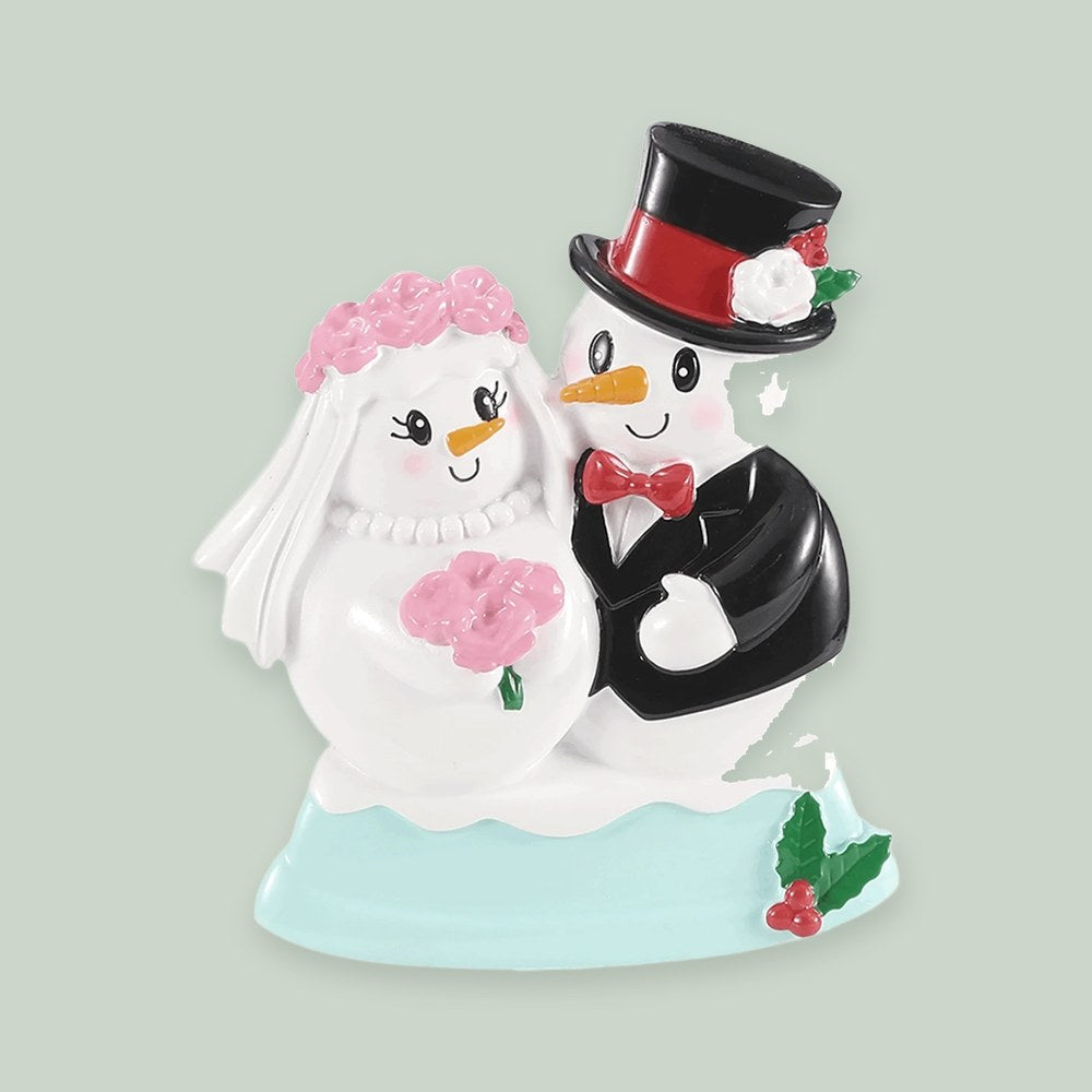 Snowman Wedding Couple ornament on a sage green background