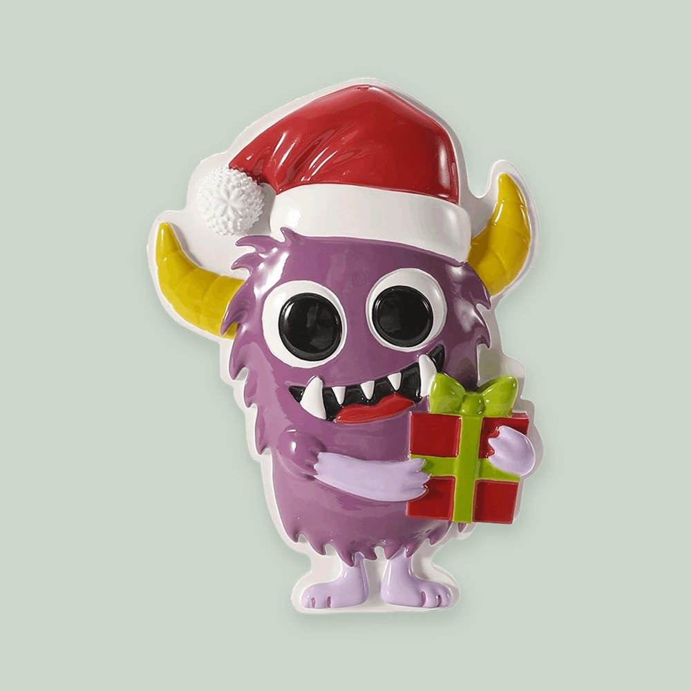 Purple Monster ornament on a sage green background