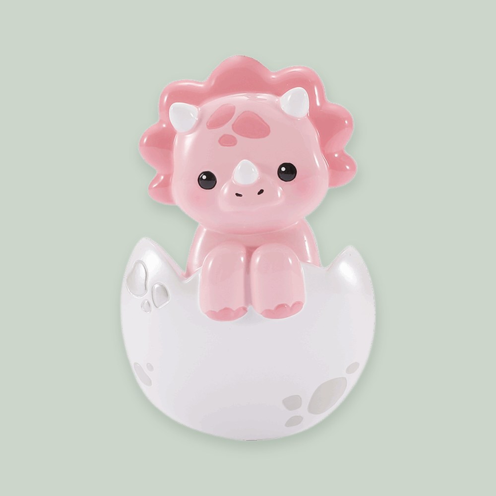 Baby Triceratops- Pink ornament on a sage green background