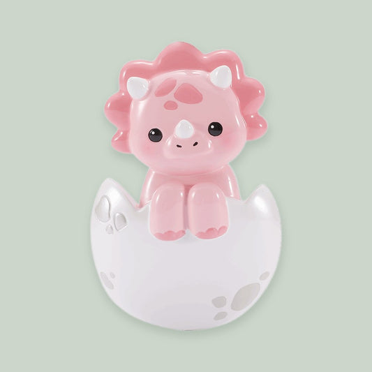 Baby Triceratops- Pink ornament on a sage green background
