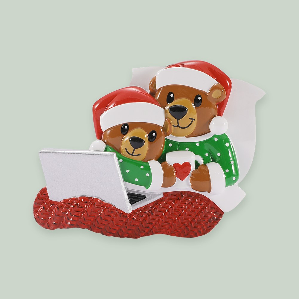 Cozy Bear Couple in Bed ornament on a sage green background