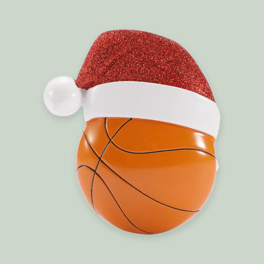 Basketball with Santa Hat ornament on a sage green background