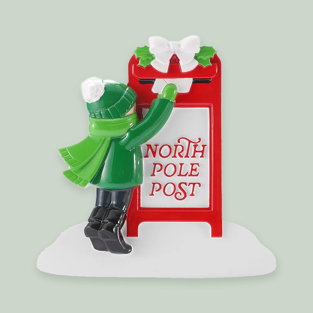 Child Sending Santa a Letter ornament on a sage green background