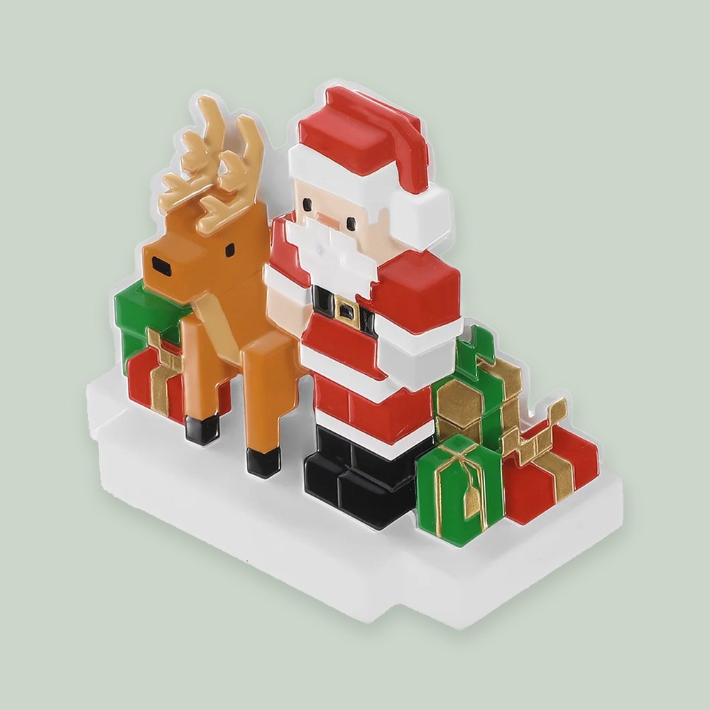 Block-Style Santa and Reindeer ornament on a sage green background