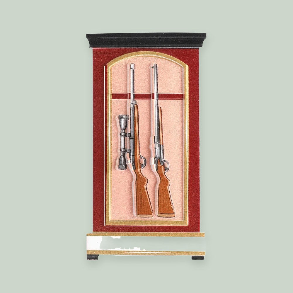 Gun Case ornament on a sage green background