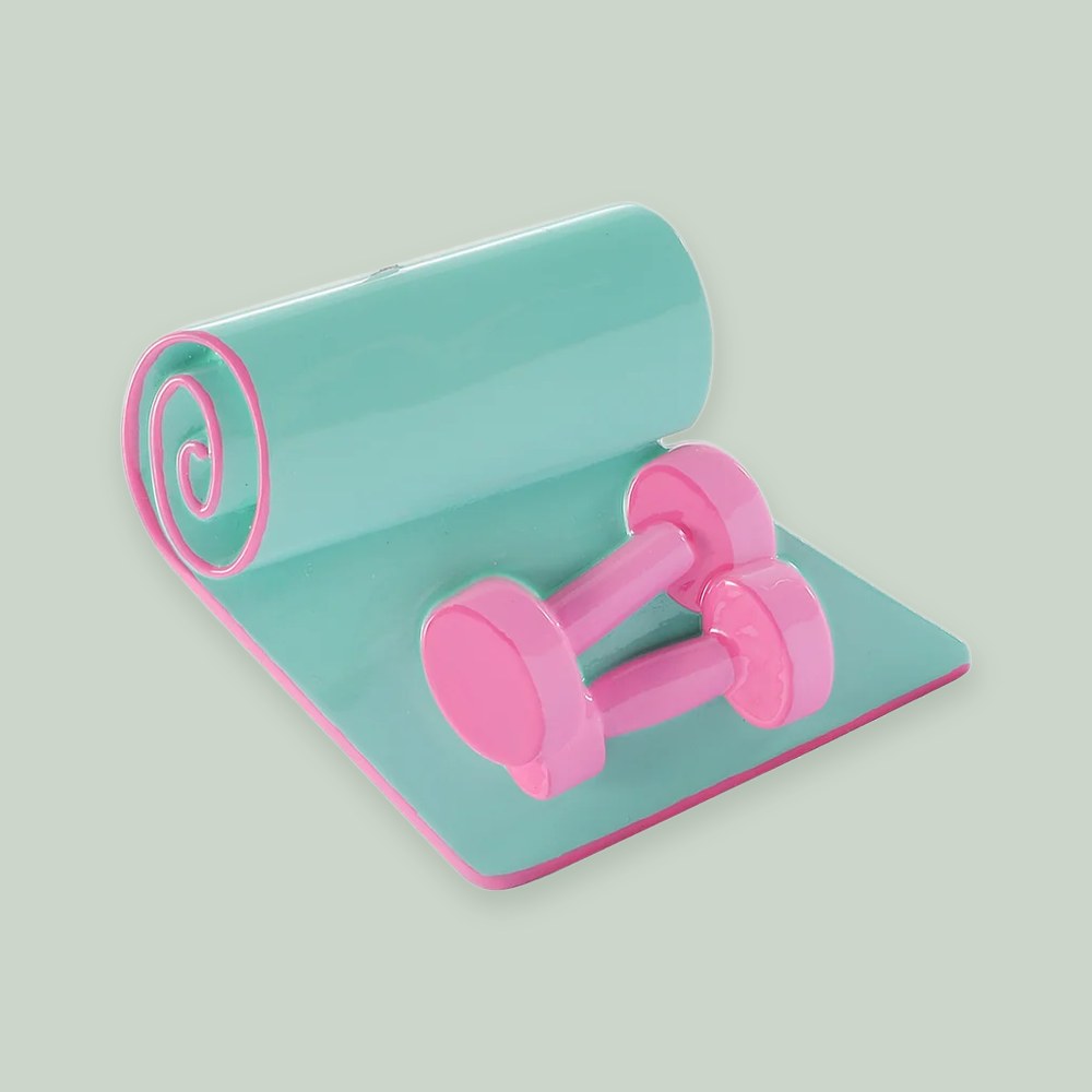 Yoga Mat and Pink Dumbbells ornament on a sage green background