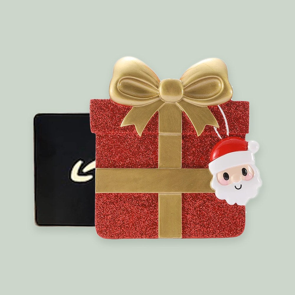 Red Glitter Gift Box Money Holder ornament on a sage green background