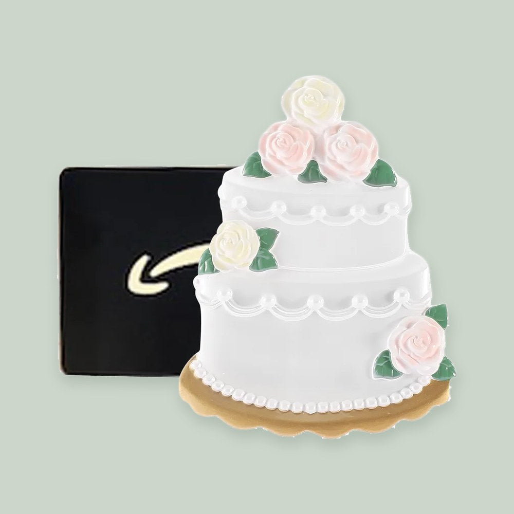 Wedding Cake Money Holder ornament on a sage green background