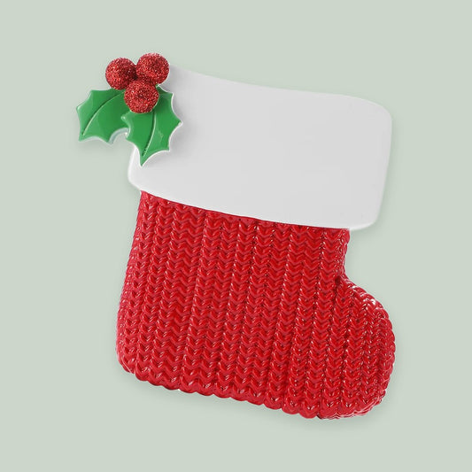 Red Stocking Money Holder ornament on a sage green background