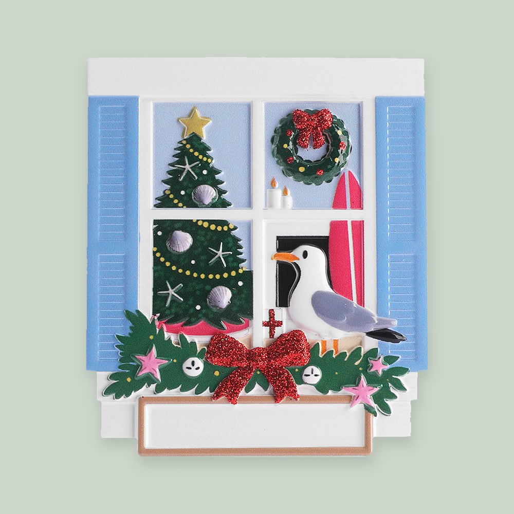 Coastal Home Christmas Window ornament on a sage green background