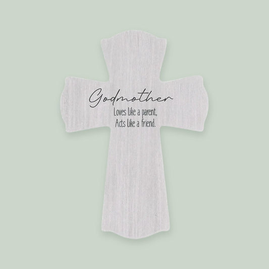 Godmother Cross ornament on a sage green background