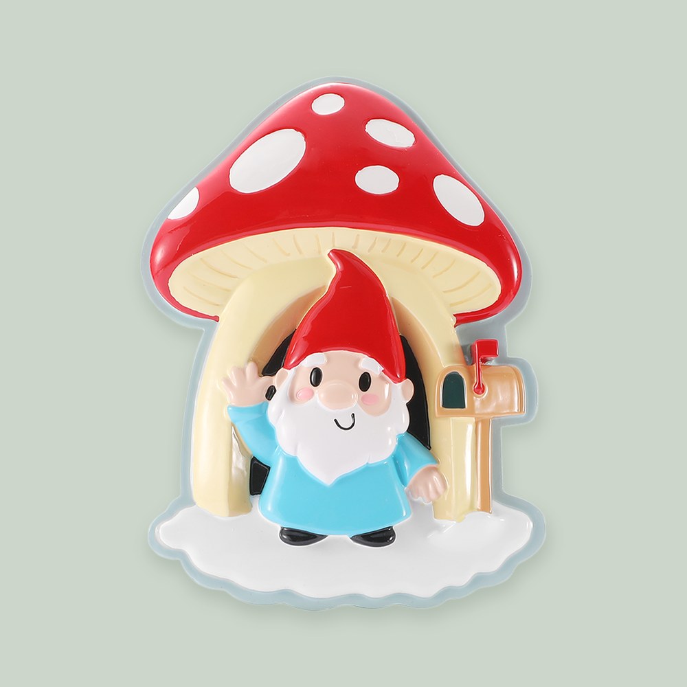 Gnome Mushroom House ornament on a sage green background