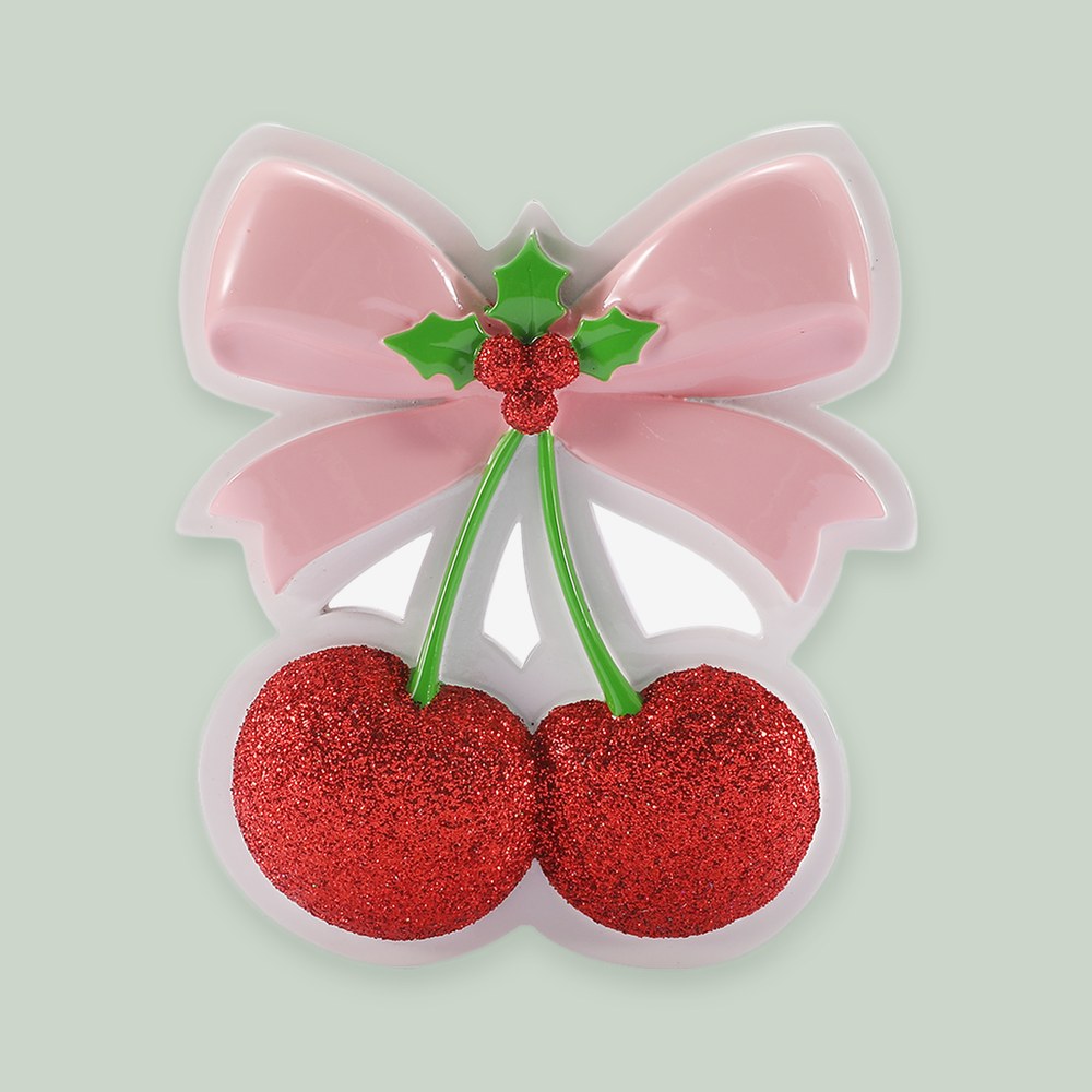 Coquette Christmas ornament on a sage green background
