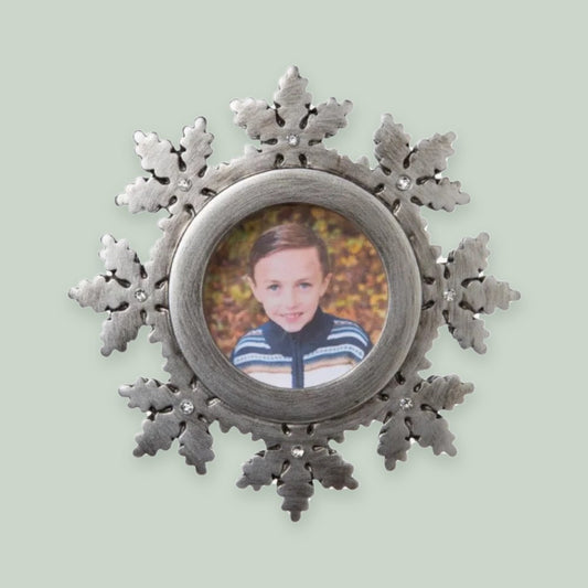 Pewter Snowflake Photo Frame ornament on a sage green background