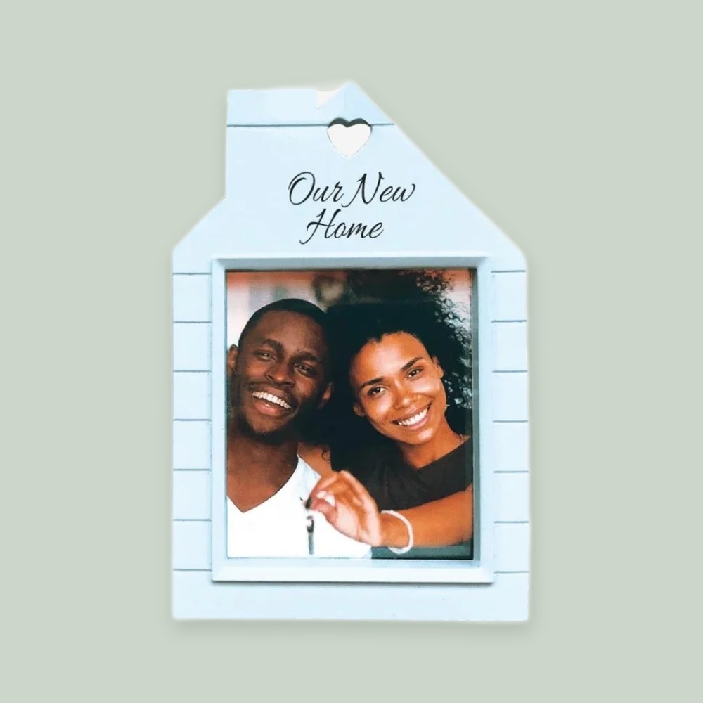 Our First Home Photo Frame ornament on a sage green background