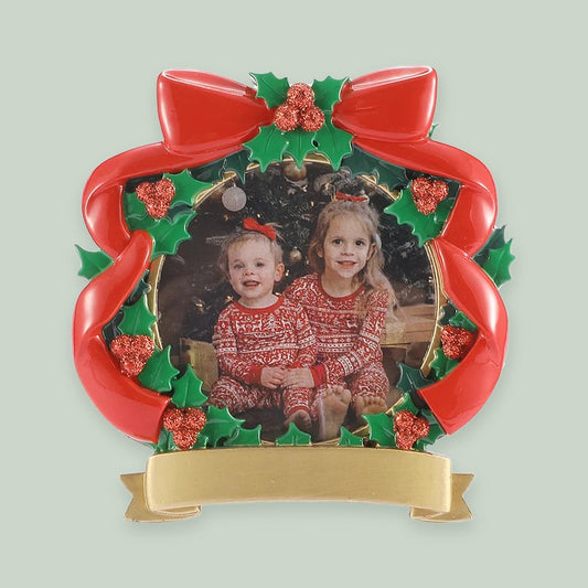 Holiday Wreath Photo Frame ornament on a sage green background