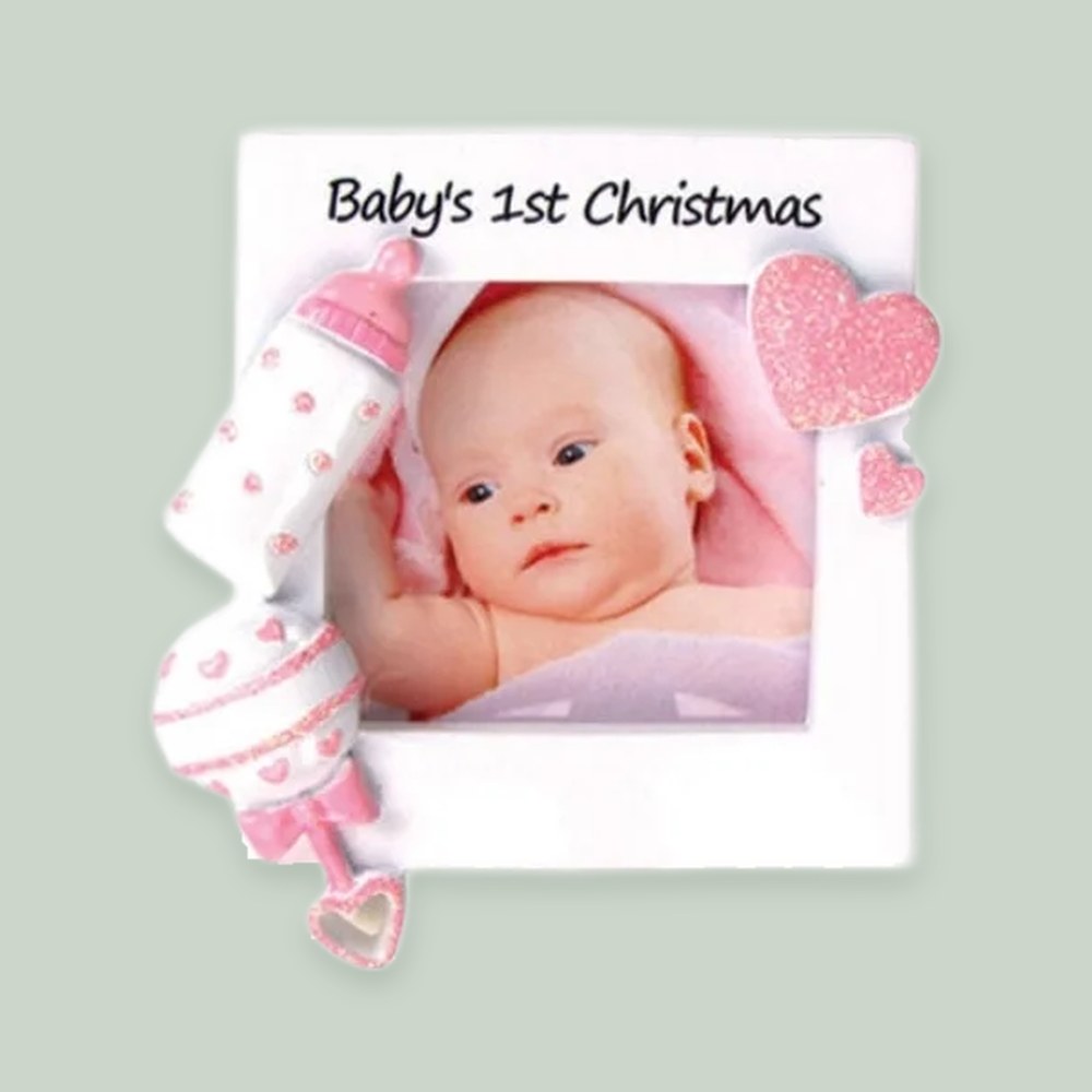 Christmas Baby Frame (Pink) ornament on a sage green background