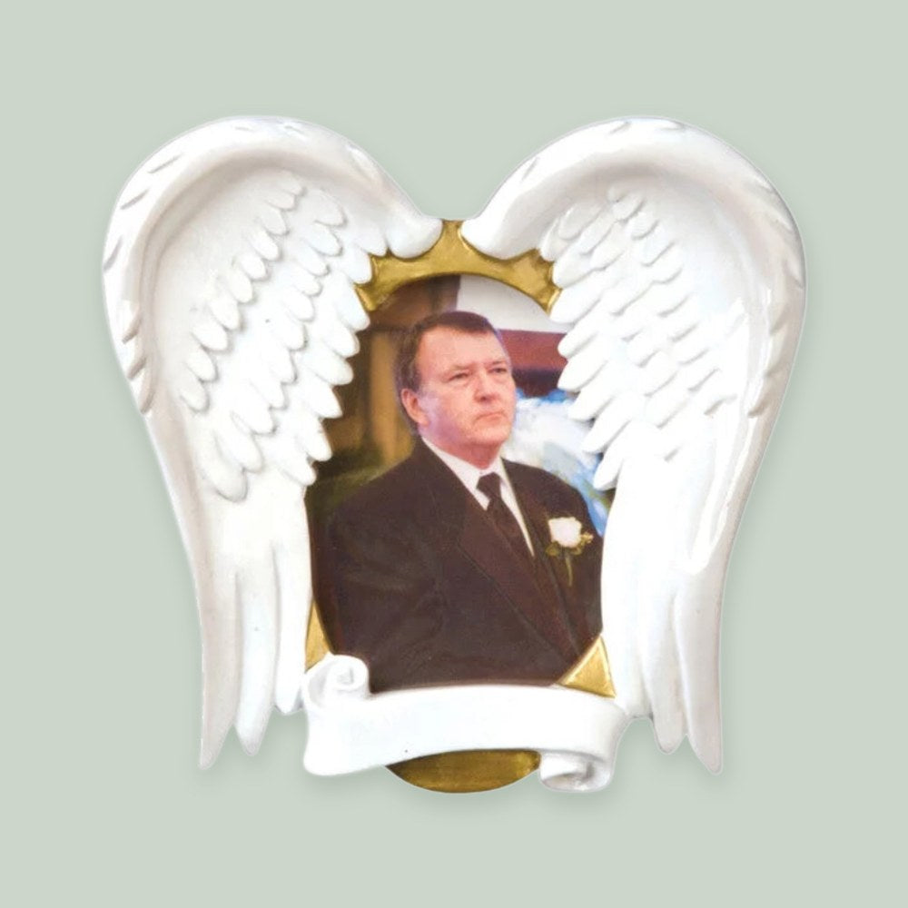 In Loving Memory Angel Wings Photo Frame ornament on a sage green background